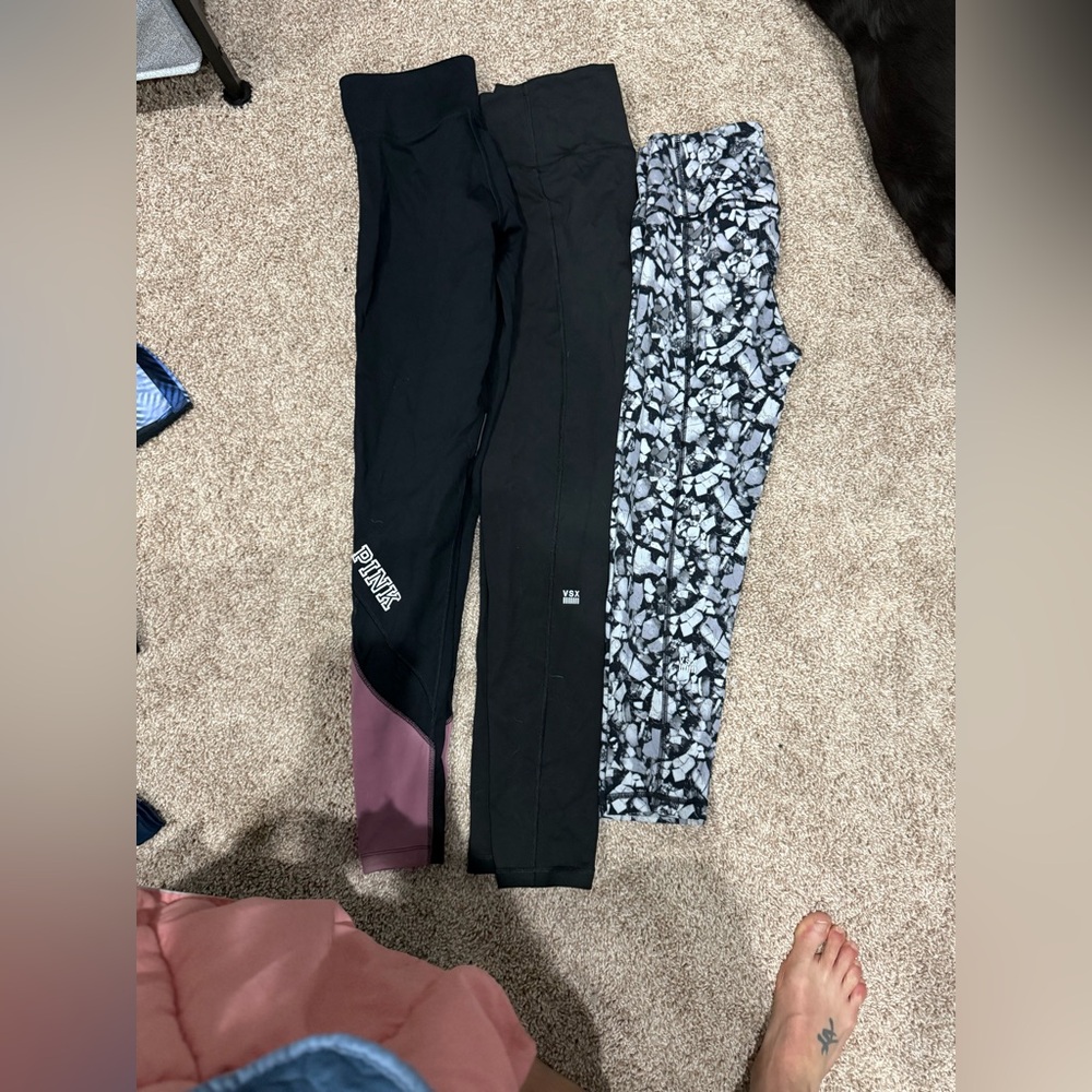 3 pair of VS/PINK workout leggings. 2 7/8 and 1 capri all Small